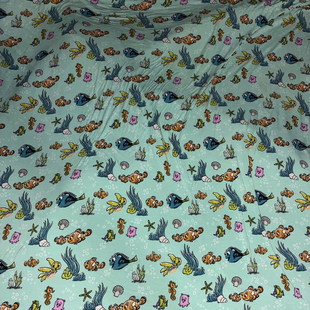 Disney Teal and Cream Fabric